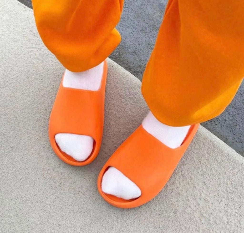 orange yeezy slides